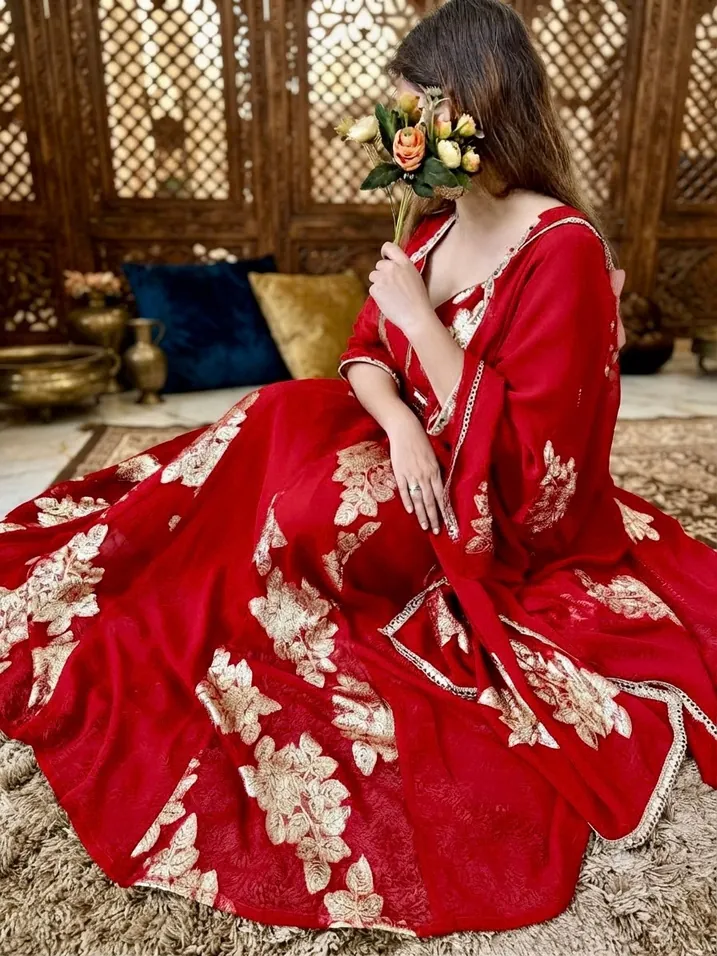 Red embroidered lehenga from the Preesha workshop