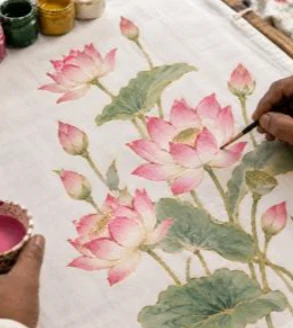 Hand-painting lotus flowers on fabric